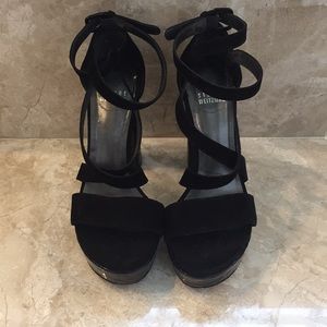 Black suede Stuart Weitzman platforms with details